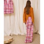 IS COMING - Pantalon large à rayures 