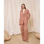 IS COMING - Pantalon large en lin 