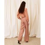 IS COMING - Pantalon large en lin 